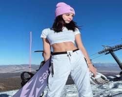 Mishka enjoys adventure sports like snowboarding in her free time.